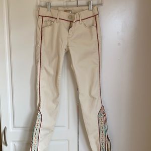 Cream/off-white MOTHER Brand jeans.